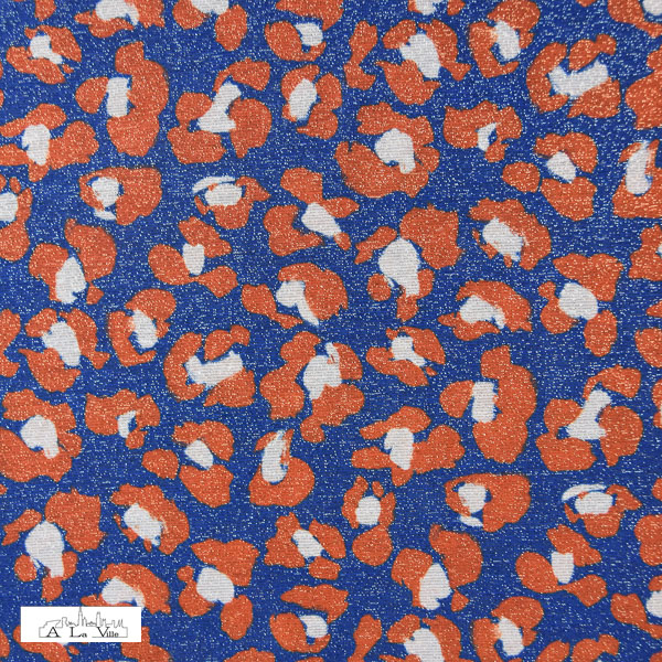 Metallic jersey blauw met oranje luipaardprint - Knipmode